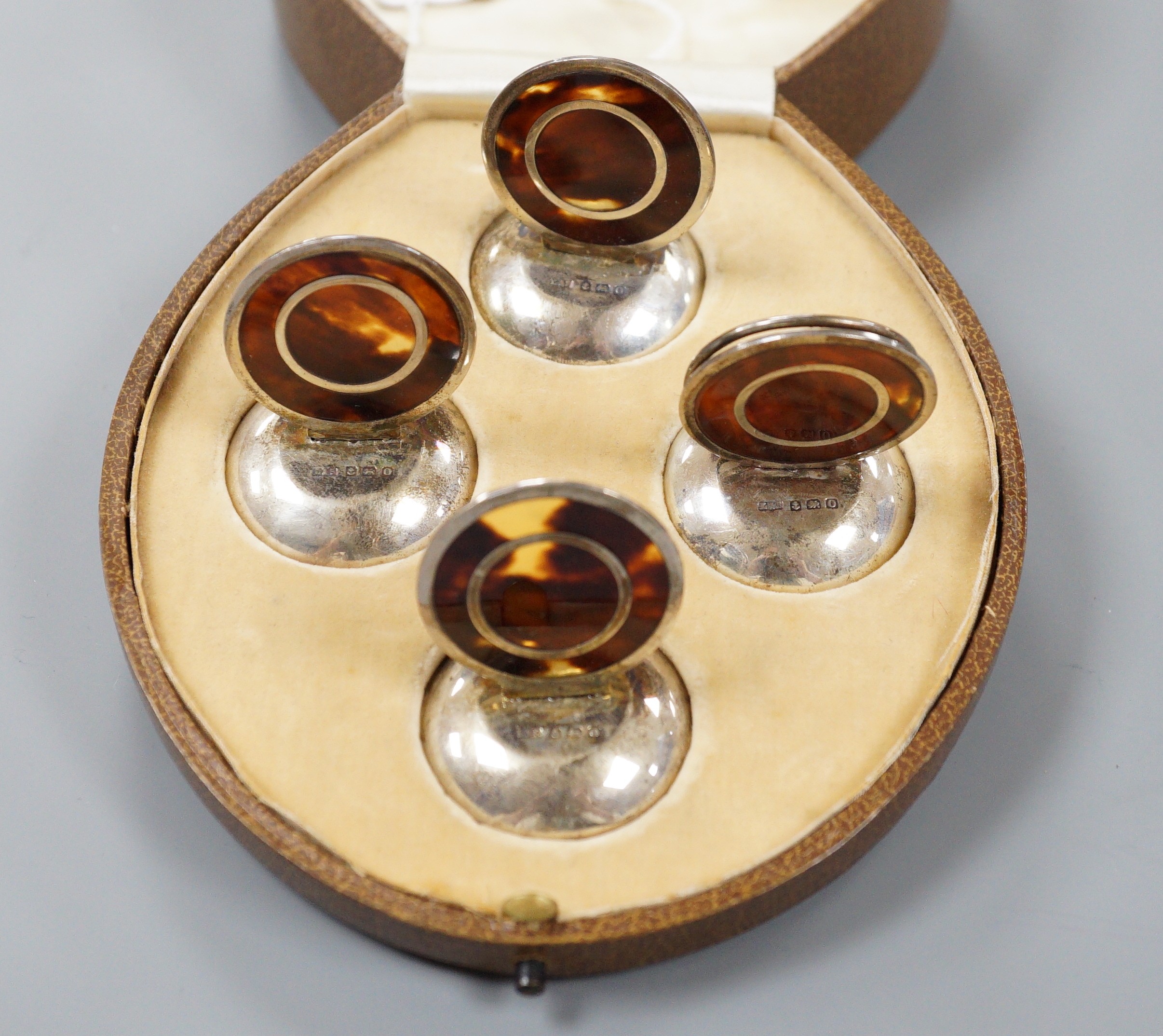 A cased set of George V four silver and tortoiseshell mounted menu holders, Levi & Salaman, Birmingham, 1913, 41mm.